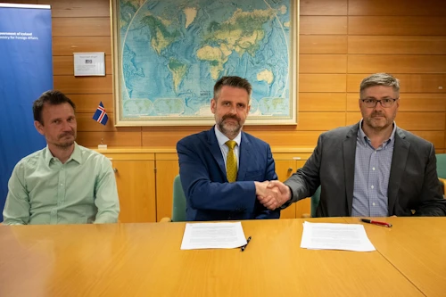 Kjartan Due Nielsen and Egill Viðarsson of Verkís with Permanent Secretary of State Martin Eyjólfsson